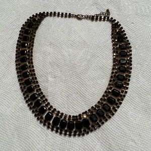 Beautiful gold tone with black crystals and stones necklace